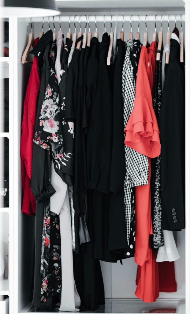 Dresses hung up in wardrobe