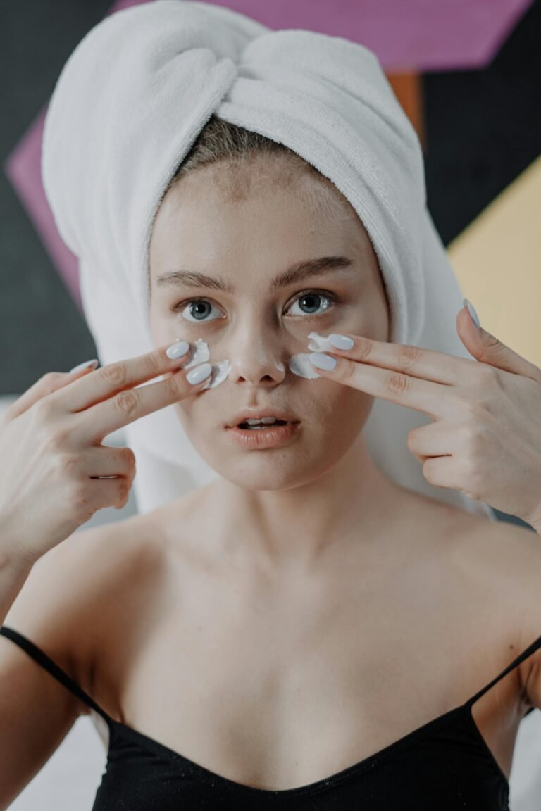 Woman using bathroom mirror